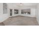 Bright living room with backyard access and large windows at 2268 S 162Nd Ln, Goodyear, AZ 85338