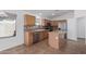 Eat-in kitchen with island and stainless steel appliances at 2268 S 162Nd Ln, Goodyear, AZ 85338