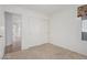 Bedroom with sliding door closet and view of hallway at 2268 S 162Nd Ln, Goodyear, AZ 85338