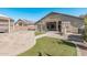 Large backyard with stone wall, artificial turf and pergola at 2268 S 162Nd Ln, Goodyear, AZ 85338