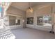 Covered patio with ceiling fan and access to backyard at 2268 S 162Nd Ln, Goodyear, AZ 85338