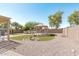 Spacious backyard with gazebo, artificial turf and stone pathway at 2268 S 162Nd Ln, Goodyear, AZ 85338