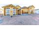 New home construction showing framing and exterior features at 7575 W Gelding Dr, Peoria, AZ 85381