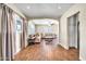 Bright living room with hardwood floors, neutral color palette, and ample natural light at 945 E Missouri Ave, Phoenix, AZ 85014