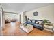 Living room with hardwood floors and a view into the adjacent room at 945 E Missouri Ave, Phoenix, AZ 85014