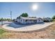 Charming ranch-style home with a curved driveway at 945 E Missouri Ave, Phoenix, AZ 85014