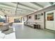 Covered patio with seating area, string lights, and access to backyard at 945 E Missouri Ave, Phoenix, AZ 85014