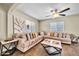 Spacious living room featuring a comfortable sectional sofa and a coffee table at 945 E Missouri Ave, Phoenix, AZ 85014