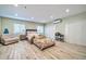 Spacious bedroom with a queen bed and built-in shelving at 945 E Missouri Ave, Phoenix, AZ 85014