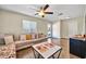 Cozy living room featuring a neutral color palette and ample natural light at 945 E Missouri Ave, Phoenix, AZ 85014