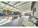 Covered patio with comfortable seating, creating a relaxing outdoor space at 945 E Missouri Ave, Phoenix, AZ 85014