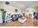 Spacious living room with hardwood floors and sofa at 945 E Missouri Ave, Phoenix, AZ 85014
