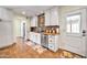 Kitchen with granite countertops and white cabinets at 945 E Missouri Ave, Phoenix, AZ 85014