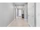 Bright entryway with tile flooring and a console table at 12379 W Chase Ln, Avondale, AZ 85323