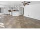 Spacious living room with tile floors and a ceiling fan at 5403 N 104Th Ave, Glendale, AZ 85307