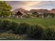 Scenic park with a large grassy area, covered pavilion, and playground at 20534 E Marsh Rd, Queen Creek, AZ 85142