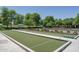Outdoor bocce ball courts with shaded seating areas at 26404 W Zachary Dr, Buckeye, AZ 85396
