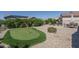 Artificial turf putting green in the backyard at 26404 W Zachary Dr, Buckeye, AZ 85396