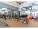 Fully equipped weight room featuring free weights, weight machines, and fitness balls at 26404 W Zachary Dr, Buckeye, AZ 85396