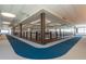 Indoor walking/running track with a blue and gray carpet at 26404 W Zachary Dr, Buckeye, AZ 85396