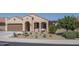 Single-story home with desert landscaping and two-car garage at 26404 W Zachary Dr, Buckeye, AZ 85396