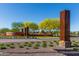Community entrance sign with landscaping at 26404 W Zachary Dr, Buckeye, AZ 85396