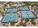 Aerial view of well-maintained tennis and pickleball courts at 26404 W Zachary Dr, Buckeye, AZ 85396