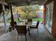 Covered patio with seating area and access to backyard at 3614 W Krall St, Phoenix, AZ 85019