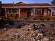 Brick ranch home with a landscaped front yard at 3614 W Krall St, Phoenix, AZ 85019