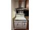 Vintage kitchen features a retro stove and overhead vent hood at 3614 W Krall St, Phoenix, AZ 85019