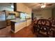 Kitchen with granite countertop and breakfast nook at 3614 W Krall St, Phoenix, AZ 85019
