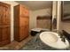 Bathroom featuring a large vanity, soaking tub, and linen closet at 3614 W Krall St, Phoenix, AZ 85019