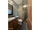 Bathroom with a toilet, sink, and shower/tub combo at 3614 W Krall St, Phoenix, AZ 85019