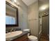 Bathroom featuring a toilet, sink, and shower/tub combo at 3614 W Krall St, Phoenix, AZ 85019