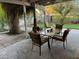 Covered patio with seating area and access to backyard at 3614 W Krall St, Phoenix, AZ 85019