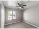 Spacious bedroom with neutral walls and carpet flooring at 20820 N 16Th Ave, Phoenix, AZ 85027