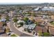 Aerial view showing home's location in a residential neighborhood with a pool at 20820 N 16Th Ave, Phoenix, AZ 85027