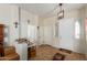 Bright and spacious entryway with tile floors and access to other rooms at 13585 W Ironwood St, Surprise, AZ 85374