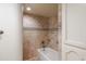 Clean bathroom with shower/tub combo and tile surround at 8230 E Via De La Escuela --, Scottsdale, AZ 85258