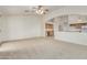 Spacious living room featuring vaulted ceilings and a view of the kitchen at 11533 E Pratt Ave, Mesa, AZ 85212