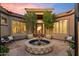 Elegant courtyard entry with fountain and seating at 9588 E Preserve Way, Scottsdale, AZ 85262