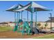 Modern playground structure with shade cover for children at 17407 W Sanna St, Waddell, AZ 85355