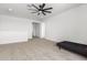 Spacious bedroom with a daybed and ceiling fan at 8823 W Wagon Wheel Dr, Glendale, AZ 85305