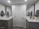Double vanity bathroom with modern gray cabinets and quartz countertop at 9017 E Butternut Ave, Mesa, AZ 85208
