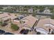 Aerial view of charming house with two-car garage and landscaped yard at 1308 W Pleasant Ln, Phoenix, AZ 85041