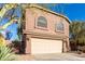 Two story house with arched windows and garage at 26207 N 47Th Pl, Phoenix, AZ 85050