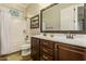 Bathroom boasts a double vanity, a shower/tub combo, and an updated design at 2299 E Saddlebrook Rd, Gilbert, AZ 85298