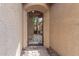 Ornate iron gate opens to a charming courtyard entry at 2299 E Saddlebrook Rd, Gilbert, AZ 85298