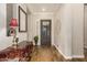 Elegant entryway with hardwood floors and decorative console table at 2299 E Saddlebrook Rd, Gilbert, AZ 85298