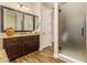 Bathroom with vanity, walk-in shower and frosted glass door at 2299 E Saddlebrook Rd, Gilbert, AZ 85298